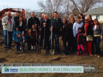 A community comes together to build a home